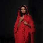 woman wearing red robe