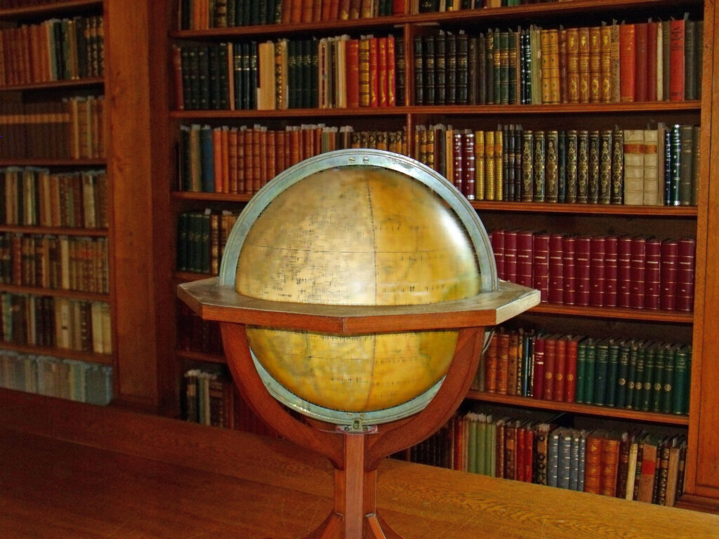 library with sepia globe