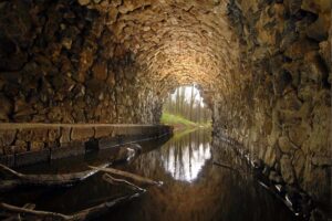 water flowing through a tunnel